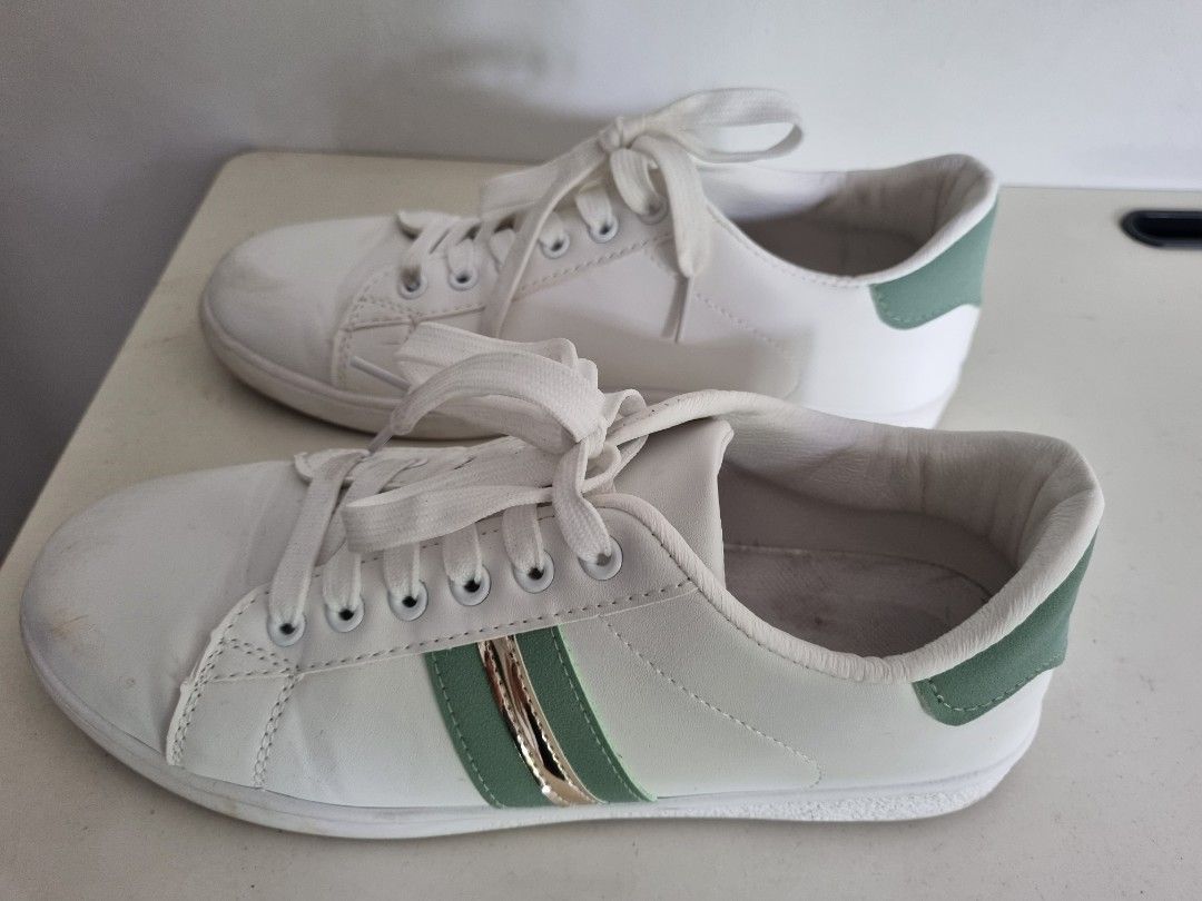 White shoes deals with green stripes