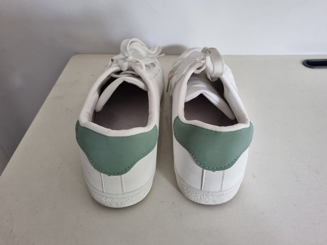 White shoes clearance with green stripes