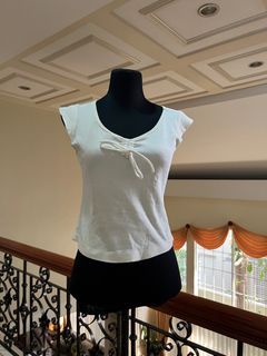 White top with ribbon