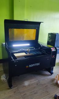 Laser engraving machine for engraving and cutting purposes