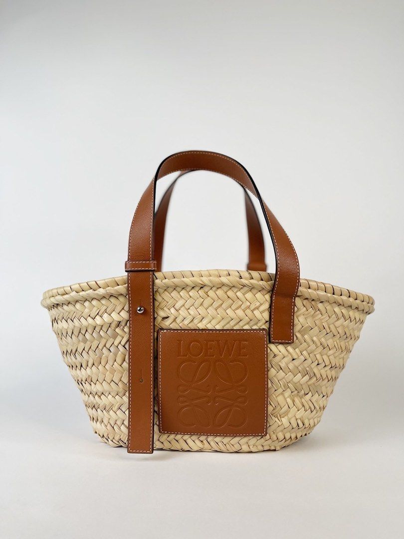 Loewe basket bag (Category: Luxury Bags & Wallets) located in Manila. Submitted by dwine_rheets (Listing ID 1230820027, Image 1). Description: Loewe Basket Bag in Palm Leaf And Calfskin Pre owned Good as new With dustbag.