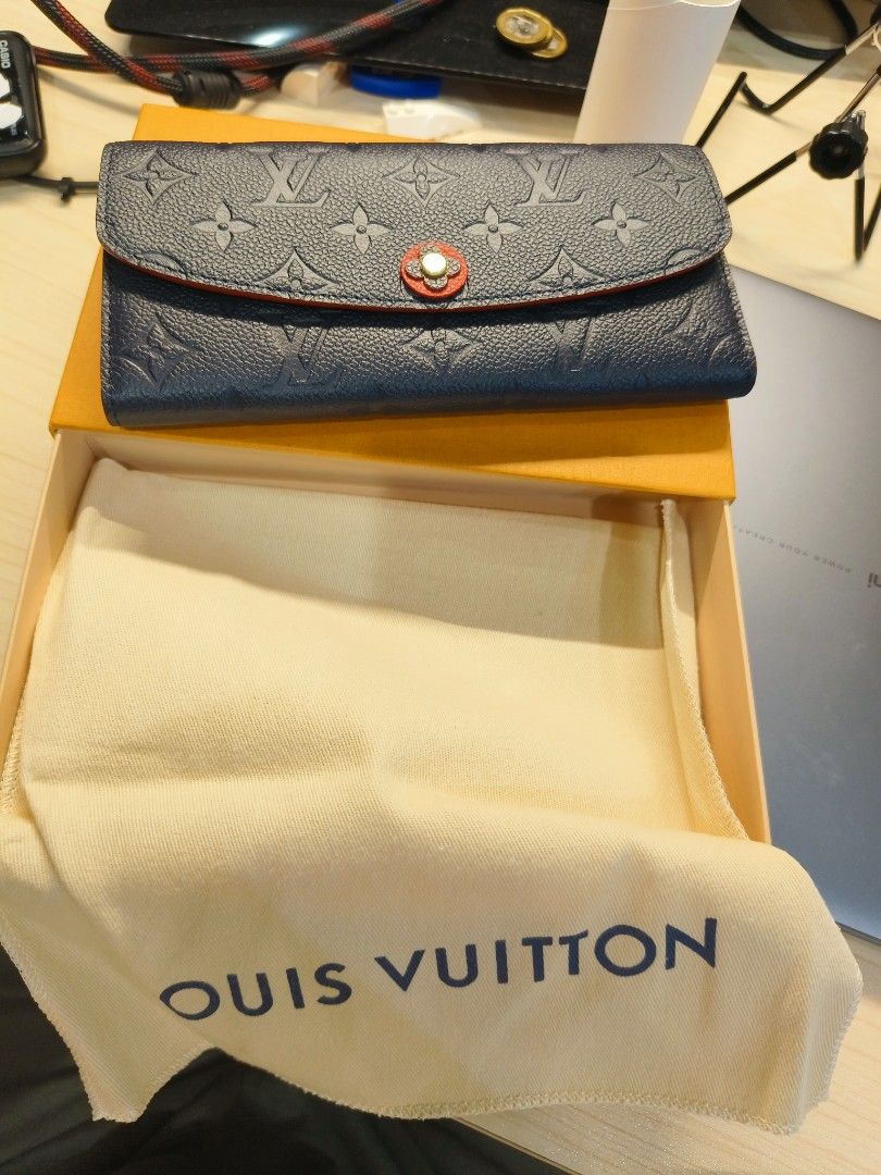 Louis Vuitton Red Empreinte Emilie Wallet, Luxury, Bags & Wallets on  Carousell