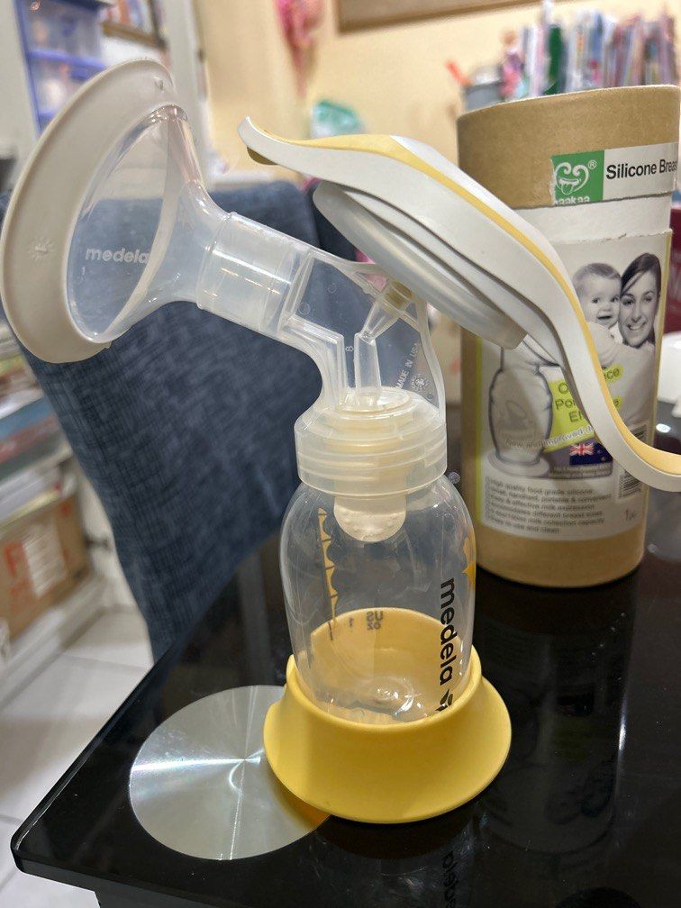 medela hand pump and original Hakka, Babies & Kids, Nursing & Feeding