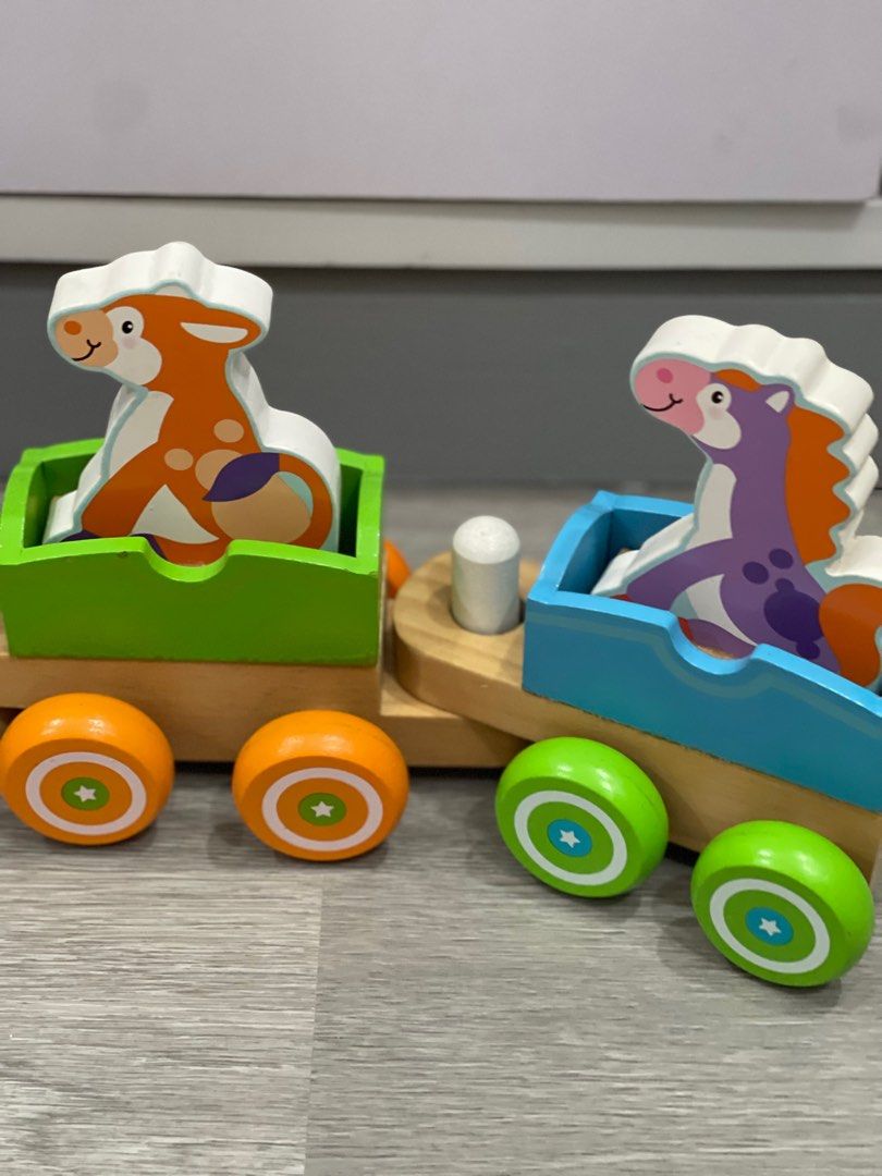 Melissa and doug rocking farm animals pull train on sale