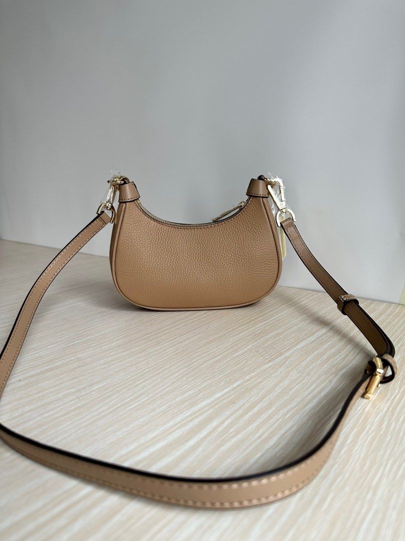 MK Cora Medium Pochette Bag, Women's Fashion, Bags & Wallets, Cross-body  Bags on Carousell