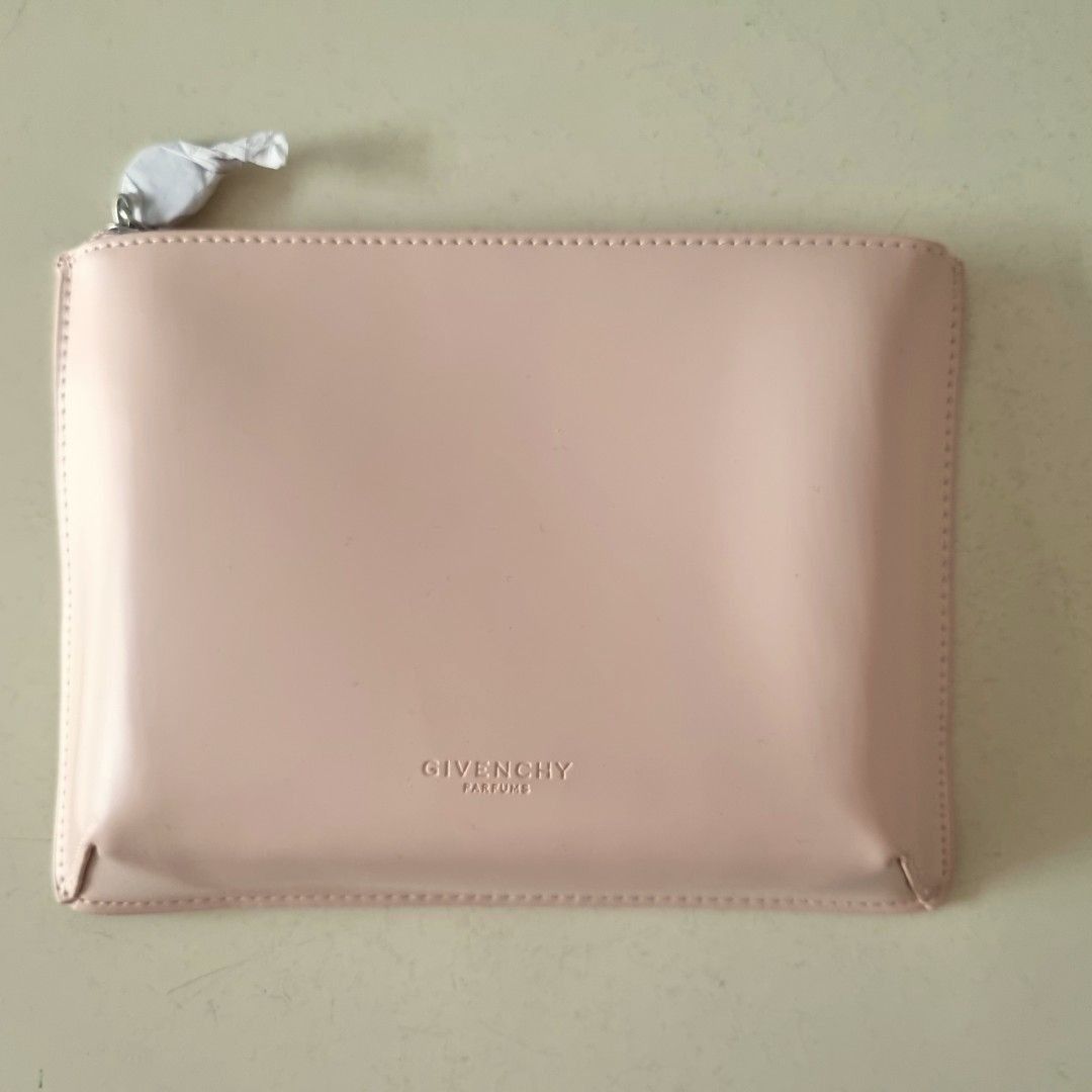 New Givenchy Cosmetics Pouch Medium Size (Category: Bags & Wallets) located in Singapore. Submitted by elaynnelaynne (Listing ID 1209716353, Image 1). Description: Brand New Soft pink cosmetics pouch. 22 x 5.5 x 5 cm.