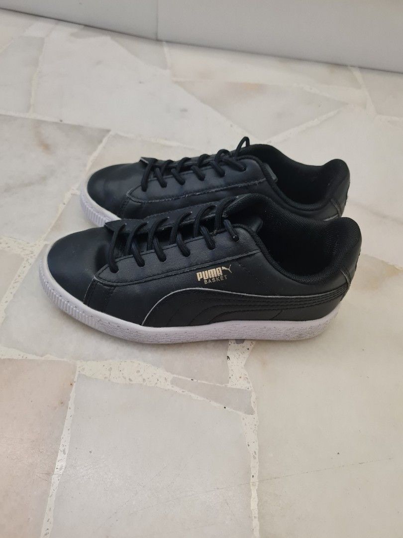 Puma unisex hotsell black sneakers
