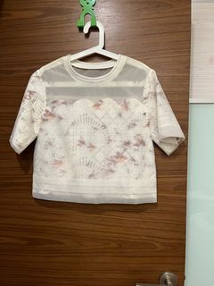 Sheer white top with patterned lace