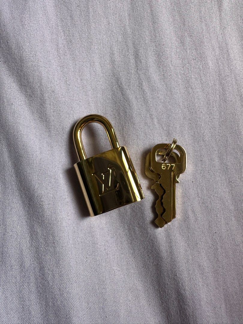 Authentic Louis Vuitton brass pad lock and key set. - Depop