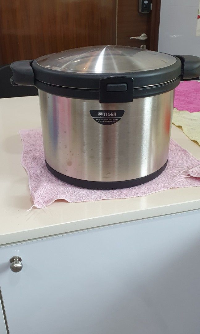 https://media.karousell.com/media/photos/products/2023/5/8/tiger_magic_thermal_cooker_1683531598_a9799dcf_progressive.jpg