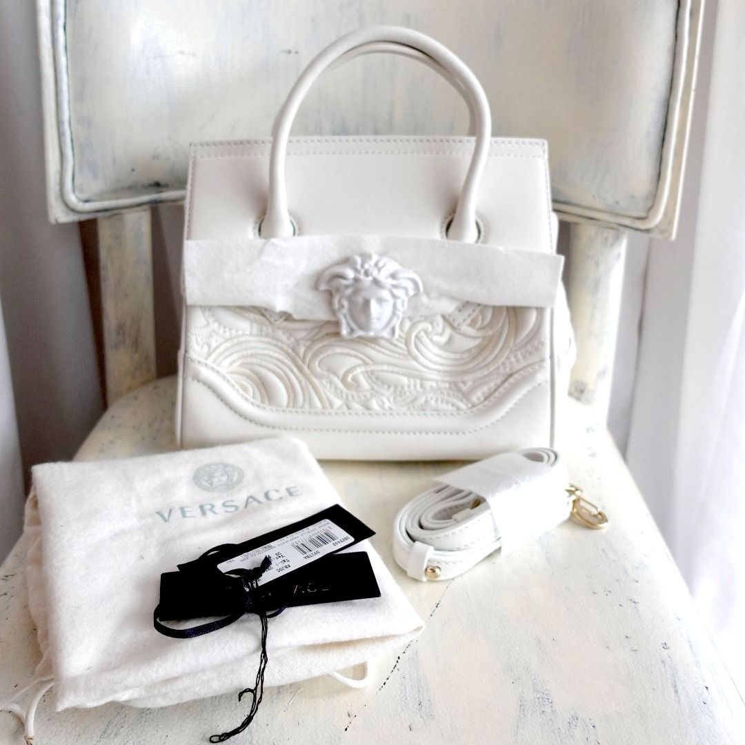 Embroidered palazzo hot sale empire bag