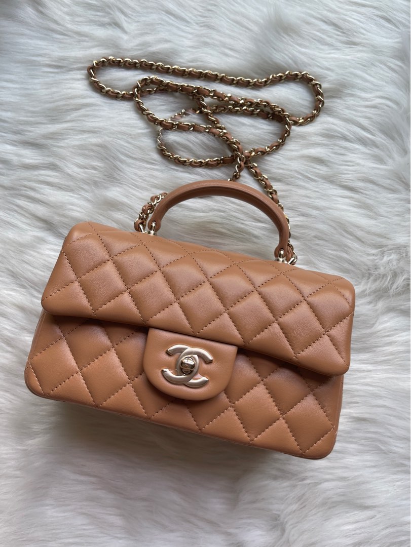 23P Caramel Chanel Mini Flap with top handle, Luxury, Bags & Wallets on  Carousell