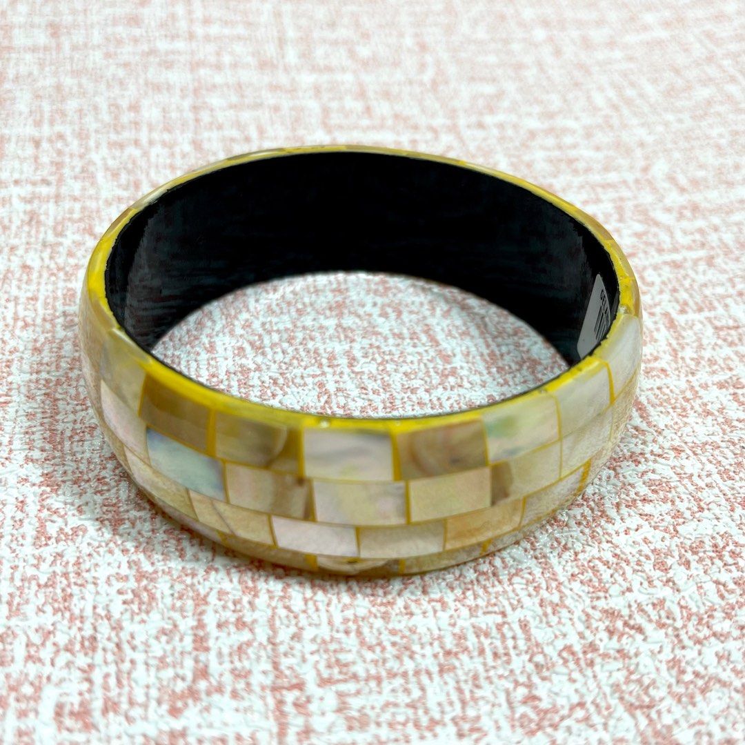 Bali Indonesia Capiz Mother of Pearl Bangle (Category: Bracelets) located in Cainta. Submitted by ellahellcat (Listing ID 1231074773, Image 3). Description: Bought in Bali. Too big for my wrist #bangle #capiz #motherofpearl #seashell #bracelet #bali #indonesia #handicraft #prelovedfashion #secondhandstyle #sustainablefashion #ecofriendlyclothing #upcycledfashion #recycledclothing #circularfashion #thriftedstyle #vintageclothing #repurposedfashion