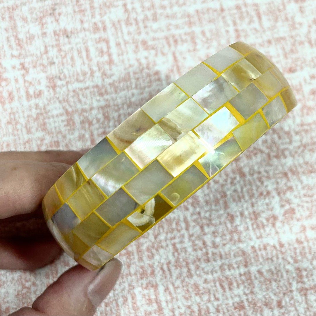 Bali Indonesia Capiz Mother of Pearl Bangle (Category: Bracelets) located in Cainta. Submitted by ellahellcat (Listing ID 1231074773, Image 2). Description: Bought in Bali. Too big for my wrist #bangle #capiz #motherofpearl #seashell #bracelet #bali #indonesia #handicraft #prelovedfashion #secondhandstyle #sustainablefashion #ecofriendlyclothing #upcycledfashion #recycledclothing #circularfashion #thriftedstyle #vintageclothing #repurposedfashion