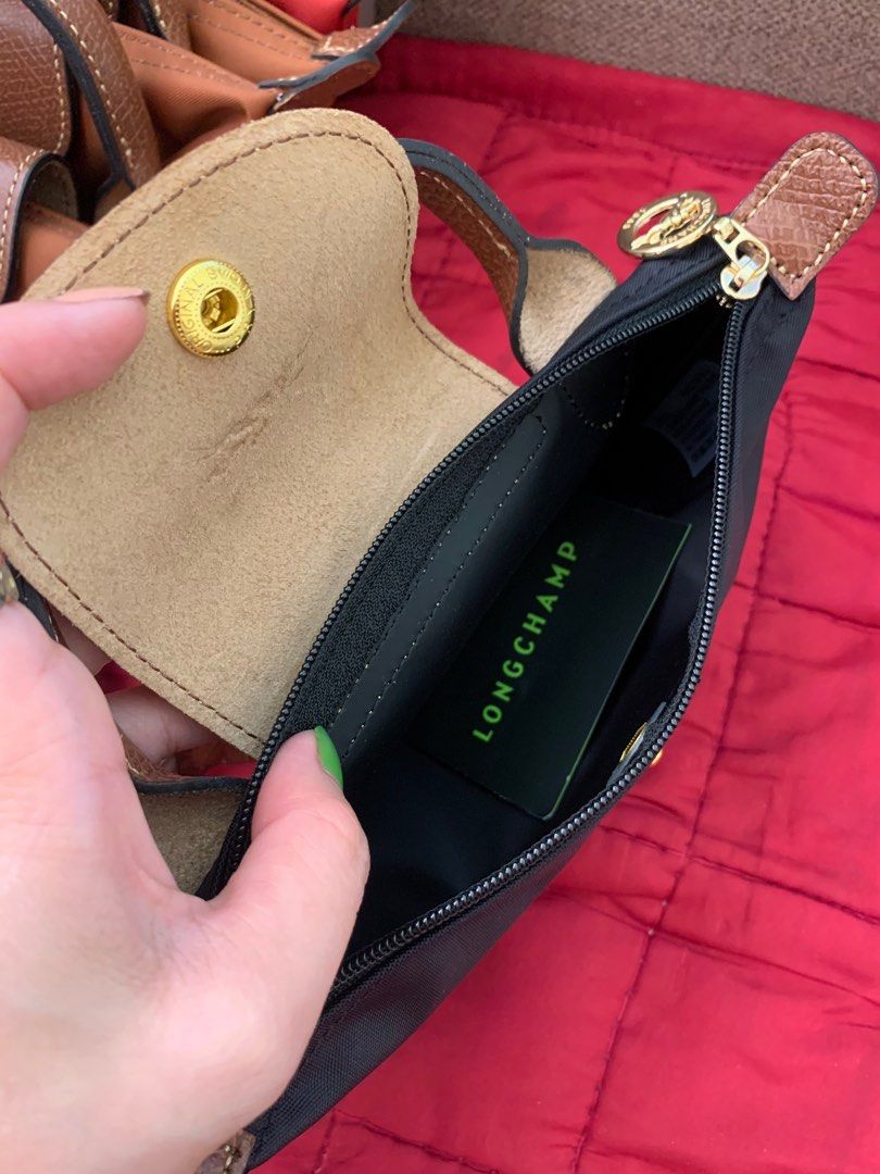 longchamp pouch mini black (Category: Luxury Bags & Wallets) located in Cabuyao City. Submitted by luxbymishy (Listing ID 1231080169, Image 3). Description: brand new condition complete inclusions 💯 original.