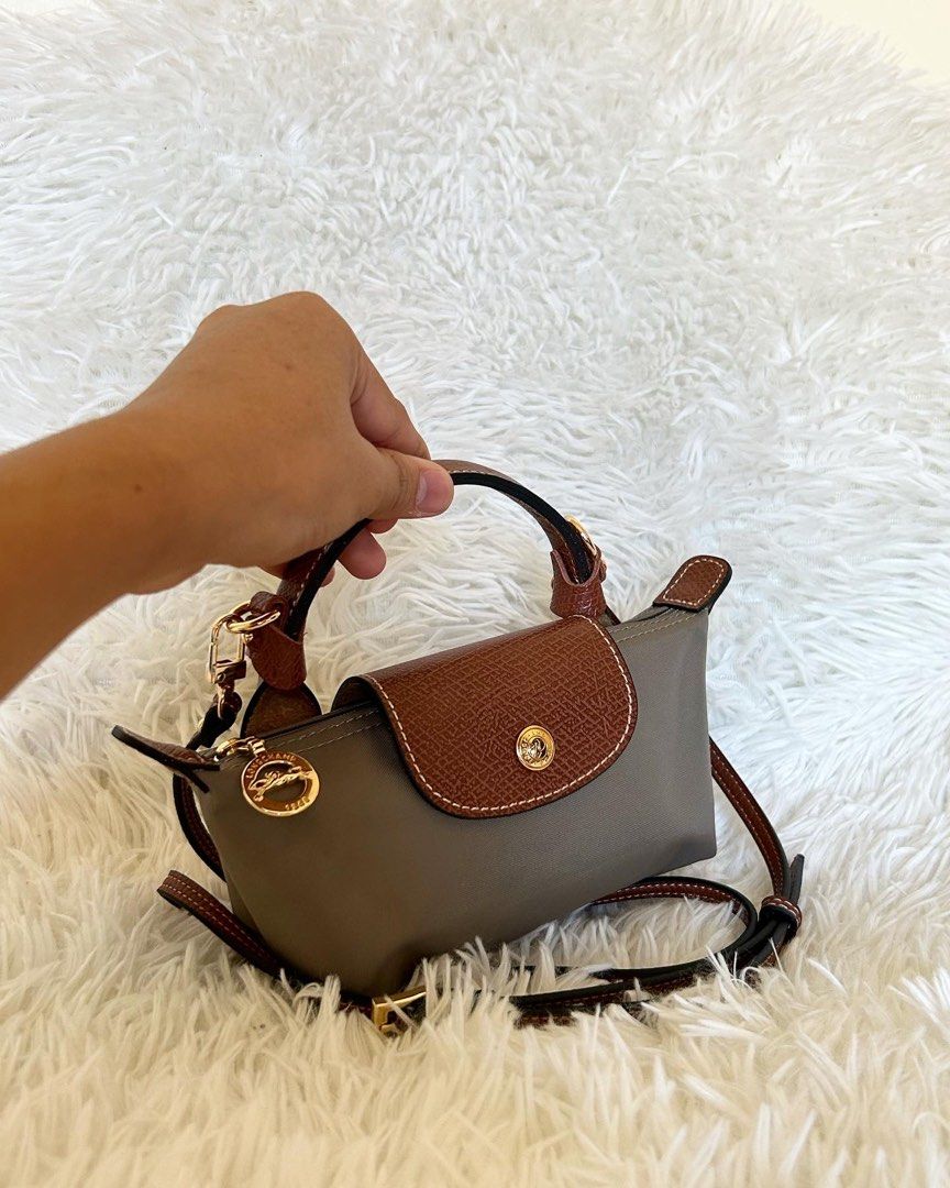 longchamp pouch with strap in grey color (Category: Luxury Bags & Wallets) located in Cabuyao City. Submitted by luxbymishy (Listing ID 1231080020, Image 3). Description: brand new condition 💯 authentic .