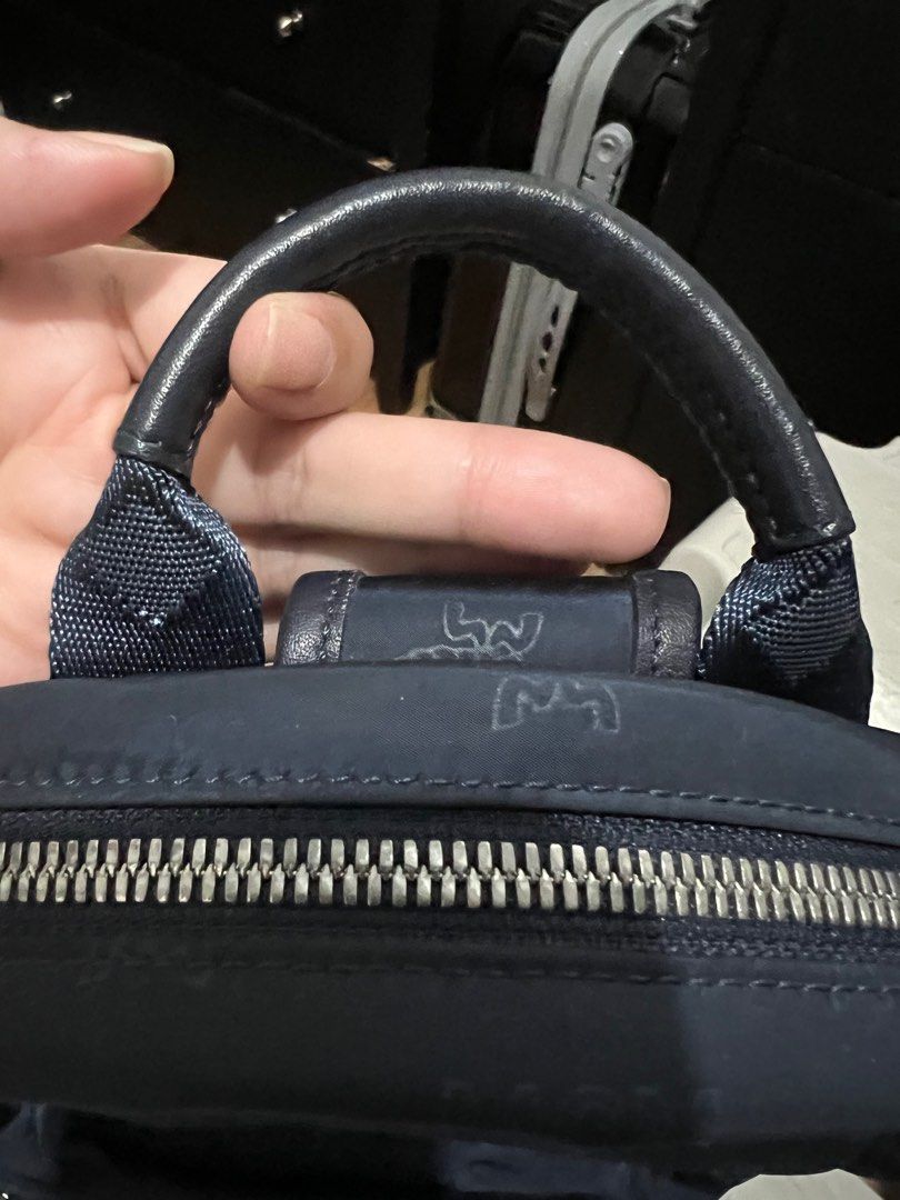 MCM Dieter Monogram Nylon Dark Blue (Category: Luxury Bags & Wallets) located in Las Pinas. Submitted by whoshotcupid (Listing ID 1230949268, Image 3). Description: GUARANTEED AUTHENTIC MONEY BACK GUARANTEE IF PROVEN FAKE 💯 Preloved. Minimal signs of usage bag is still in excellent condition. No flaws. > No dust bag. > With authenticity and care cards.