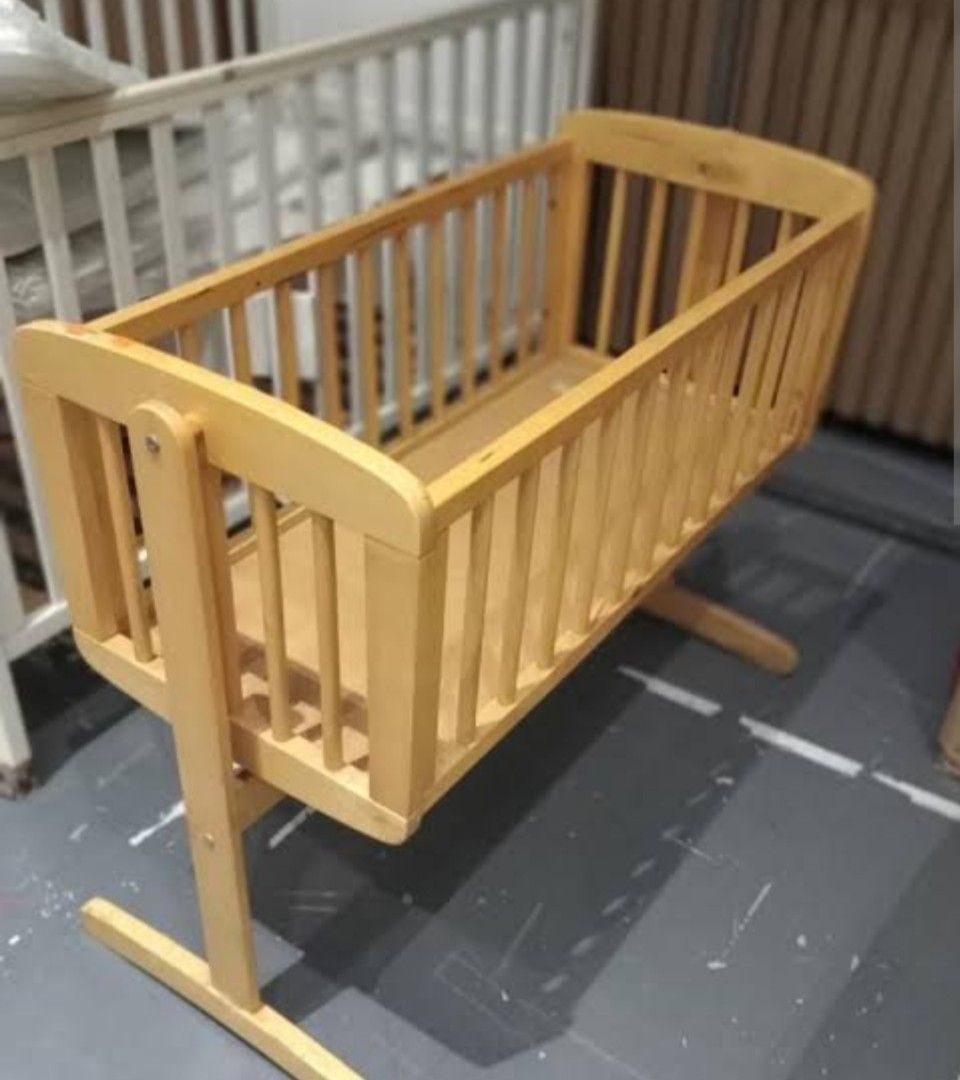 Mothercare swinging online crib natural