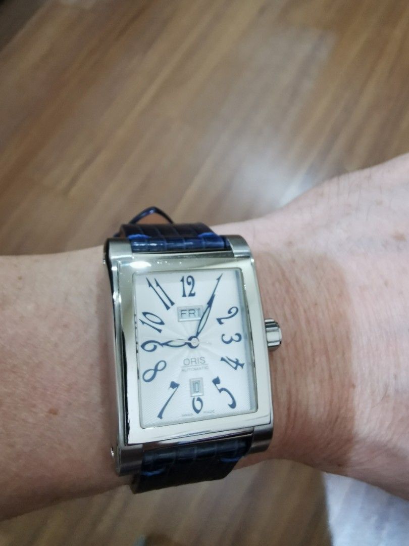 Oris rectangular titan day date deals