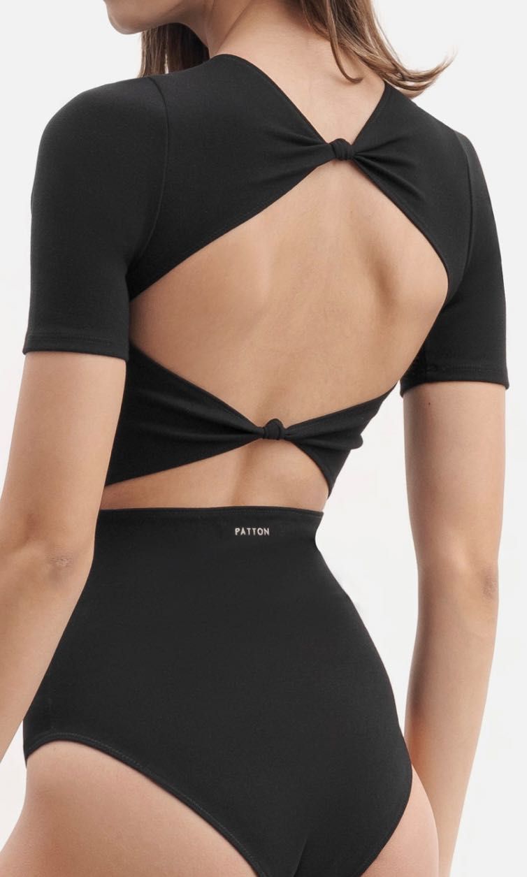 PATTON STUDIO Short Sleeve Knotted Back Bodysuit (XS) (Category: Others Tops) located in Quezon City. Submitted by michaelacd (Listing ID 1230917784, Image 1). Description: PATTON STUDIO Short Sleeve Knotted Back Bodysuit in black size: XS (will probably fit w23-25 best) - brand new but already washed so the tag’s already detached - ordered online and paid extra 400 for same day shipping - super cute!! RFS: it’s too tight for my liking. Please bu