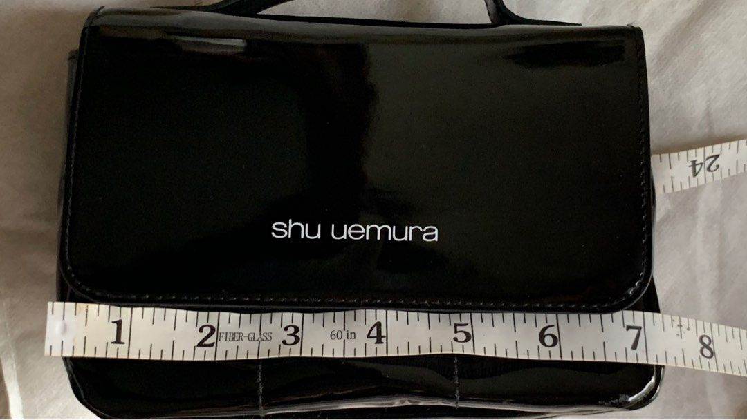 Shi Uemura vanity bag / make up bag (Category: Purses & Pouches) located in Malolos. Submitted by flapnbloom.ph (Listing ID 1231077632, Image 3). Description: Brand: Shi Uemura, from Japan, unused with minimal signs of storage MOP: BPI transfer/GCash Pm for inquiries .