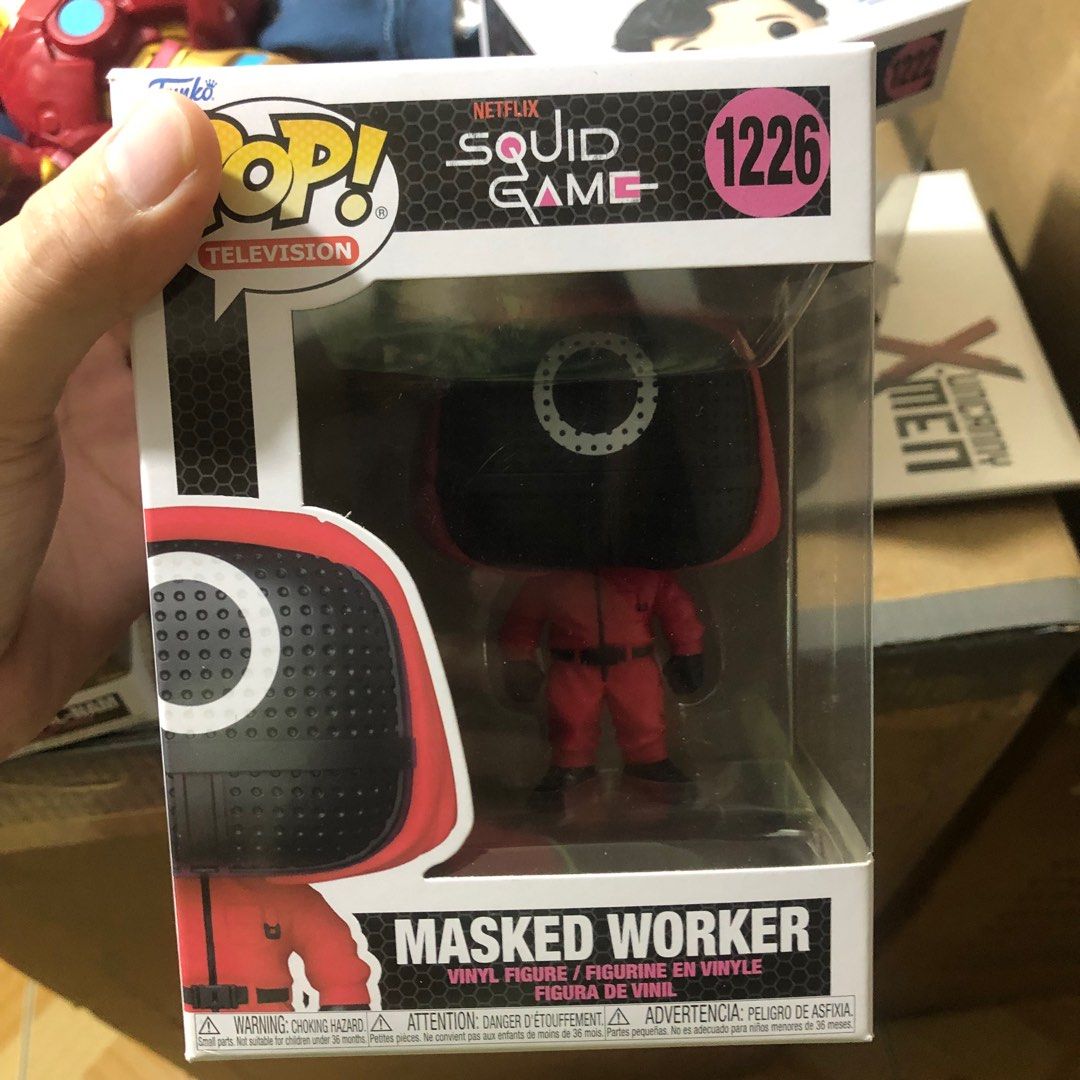 SQUID GAME MASKED WORKER (Category: Designer & Blind Box Toys) located in Binan City. Submitted by elf.0000 (Listing ID 1230923605, Image 1). Description: P500 plus shipping cost Box is not in mint condition Not recommended for mint collectors What you see is what you get Payment via gcash or bpi Shipped via jnt (toktok/lalamove for same day delivery).