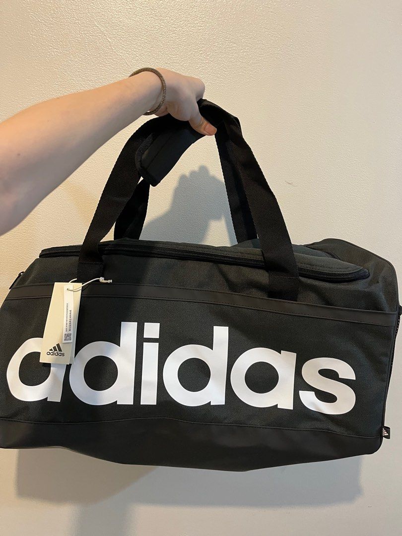 Adidas Linear Duffle Bag Medium, Men's Fashion, Bags, Backpacks on