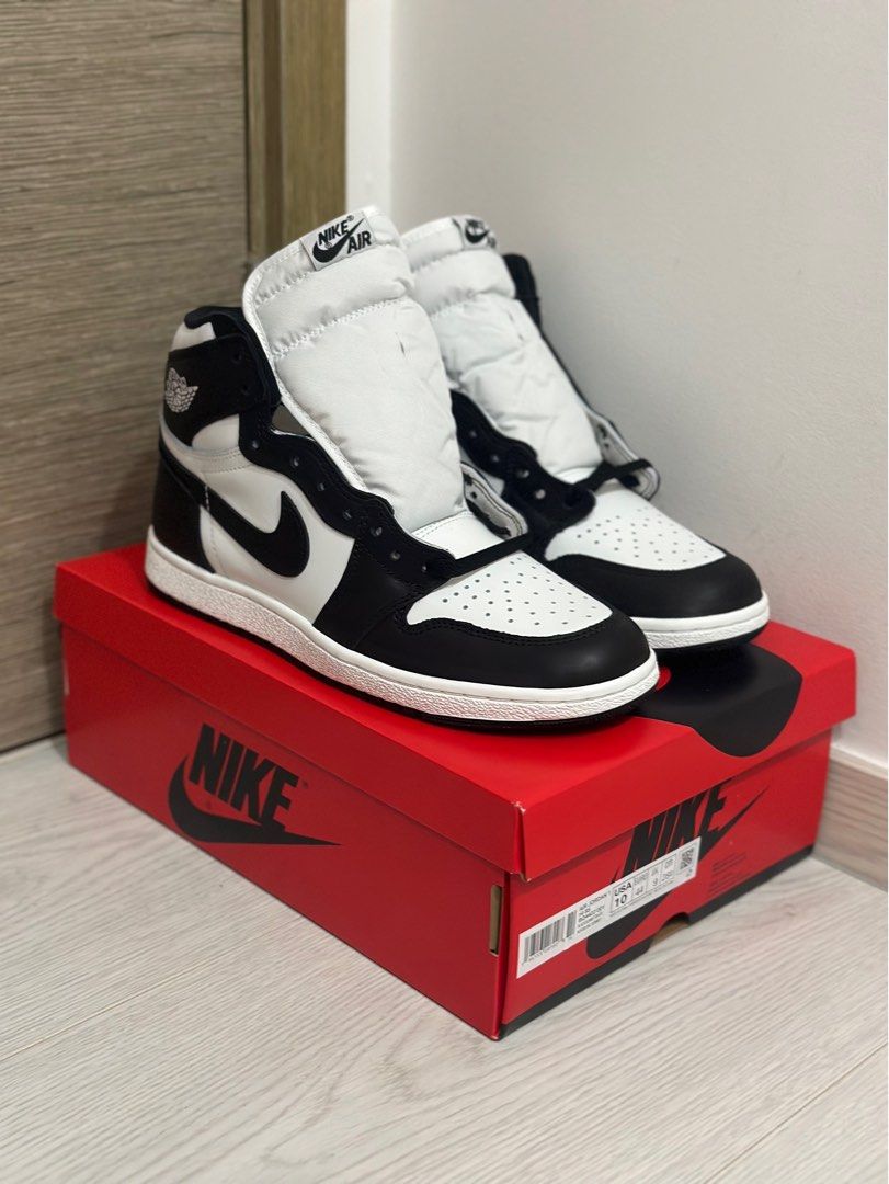 All white store high top jordans