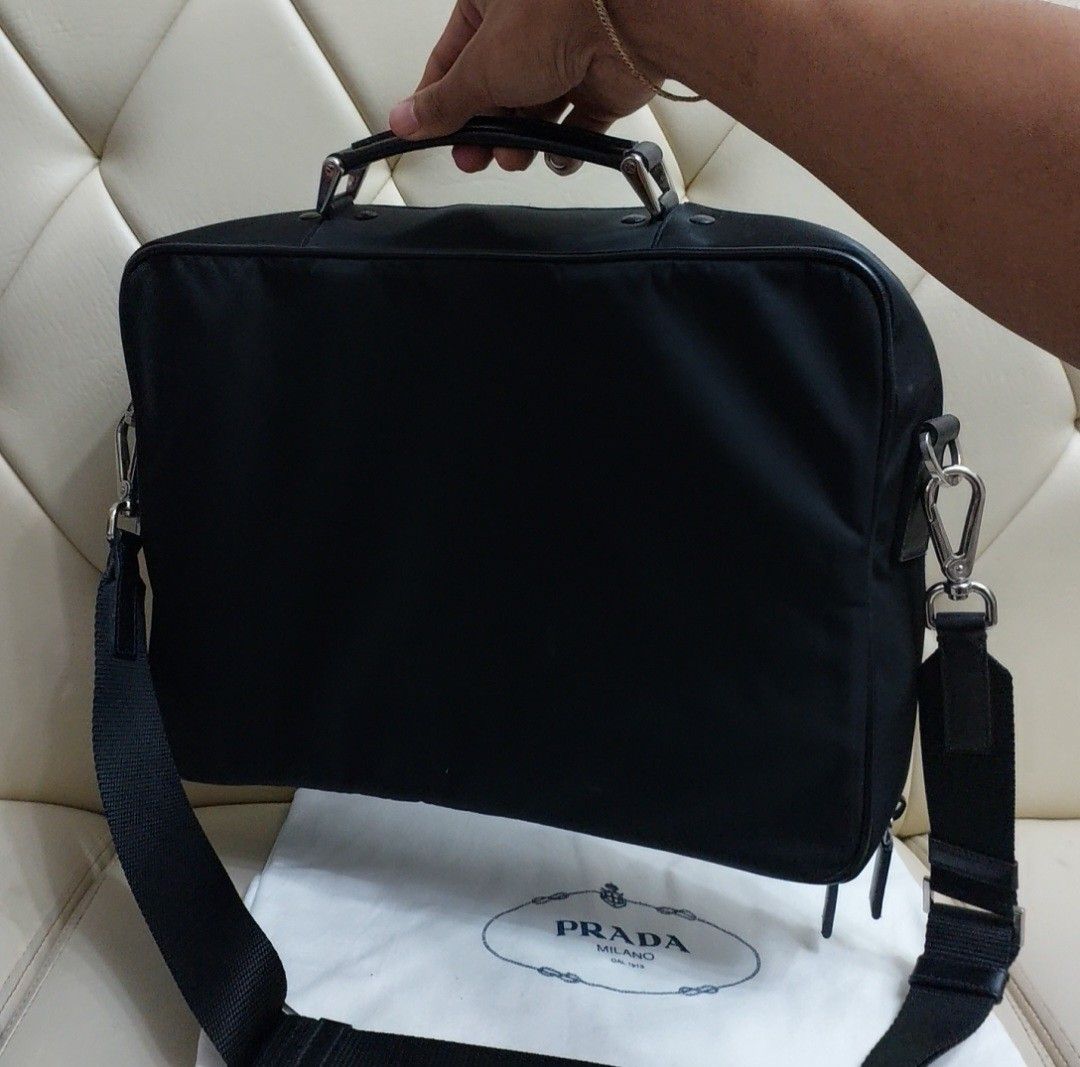 Authentic Prada laptop bag/ messager bag (Category: Luxury Bags & Wallets) located in Binangonan. Submitted by makoleksyon (Listing ID 1235082534, Image 3). Description: excellent condition no flaws bought in Japan L16x H11.5xW3 inches with dust bag included 💯% Authentic Money back guarantee.