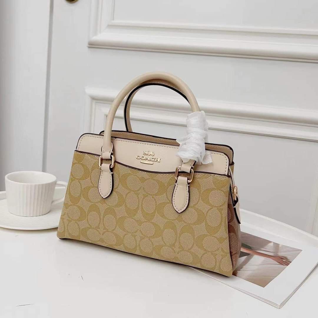 Coach Mini Darcie (Category: Luxury Bags & Wallets) located in Rizal. Submitted by LuxbyMarifrance (Listing ID 1235005278, Image 2). Description: 🏷️ 3,000 only + SF 💼 Coach Mini Darcie Carryall in Signature Canvas 📏 10 1/4” (L) x 6 3/4” (H) x 4 1/4” (W) 📌 with dust bag and paper bag ✨All trademarks, logos and brand names are reserved and property of the original brand owners. #coachph #authenticqualitybagsph #authenticqualitybags #lowestprice