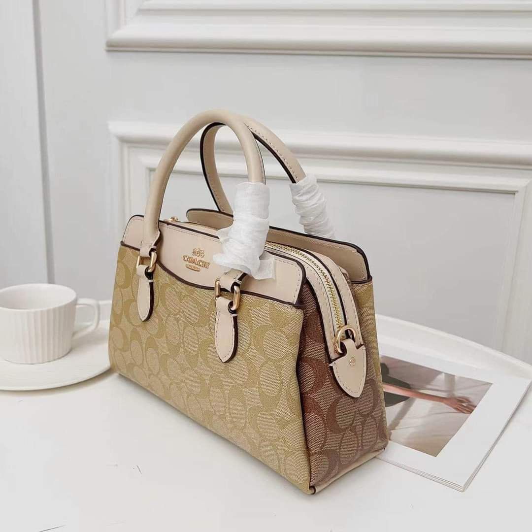 Coach Mini Darcie (Category: Luxury Bags & Wallets) located in Rizal. Submitted by LuxbyMarifrance (Listing ID 1235005278, Image 1). Description: 🏷️ 3,000 only + SF 💼 Coach Mini Darcie Carryall in Signature Canvas 📏 10 1/4” (L) x 6 3/4” (H) x 4 1/4” (W) 📌 with dust bag and paper bag ✨All trademarks, logos and brand names are reserved and property of the original brand owners. #coachph #authenticqualitybagsph #authenticqualitybags #lowestprice