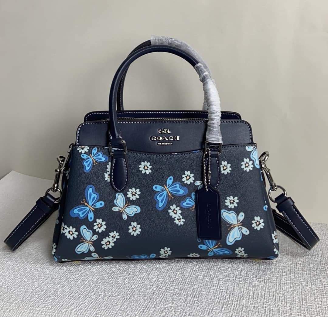 Coach Mini Darcie Caryall with Butterfly Print (Category: Luxury Bags & Wallets) located in Rizal. Submitted by LuxbyMarifrance (Listing ID 1235004781, Image 1). Description: 🏷️ 3,000 only + SF 💼 Coach Mini Darcie Carryall With Lovely Butterfly Print 📏 10 1/4” (L) x 6 3/4” (H) x 4 1/4” (W) 📌 with dust bag and paper bag ✨All trademarks, logos and brand names are reserved and property of the original brand owners. #coachph #authenticqualitybags