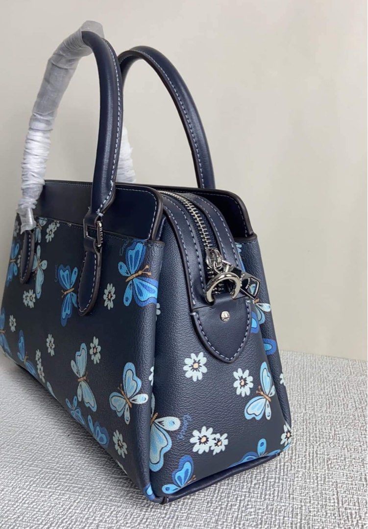 Coach Mini Darcie Caryall with Butterfly Print (Category: Luxury Bags & Wallets) located in Rizal. Submitted by LuxbyMarifrance (Listing ID 1235004781, Image 3). Description: 🏷️ 3,000 only + SF 💼 Coach Mini Darcie Carryall With Lovely Butterfly Print 📏 10 1/4” (L) x 6 3/4” (H) x 4 1/4” (W) 📌 with dust bag and paper bag ✨All trademarks, logos and brand names are reserved and property of the original brand owners. #coachph #authenticqualitybags