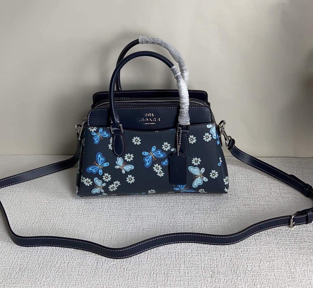 Coach Mini Darcie Caryall with Butterfly Print (Category: Luxury Bags & Wallets) located in Rizal. Submitted by LuxbyMarifrance (Listing ID 1235004781, Image 2). Description: 🏷️ 3,000 only + SF 💼 Coach Mini Darcie Carryall With Lovely Butterfly Print 📏 10 1/4” (L) x 6 3/4” (H) x 4 1/4” (W) 📌 with dust bag and paper bag ✨All trademarks, logos and brand names are reserved and property of the original brand owners. #coachph #authenticqualitybags
