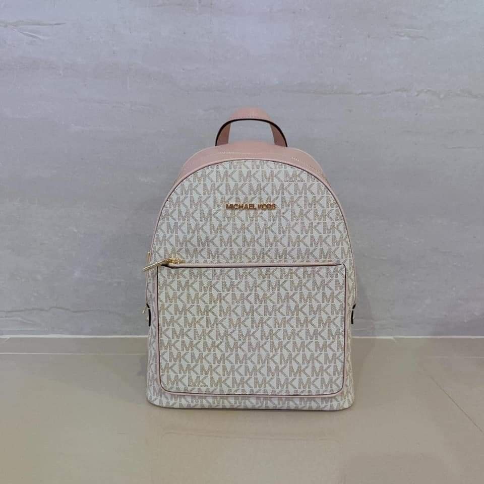 Pink and white michael kors backpack store