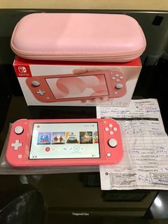 Nintendo switch lite with Games 2 Mos old