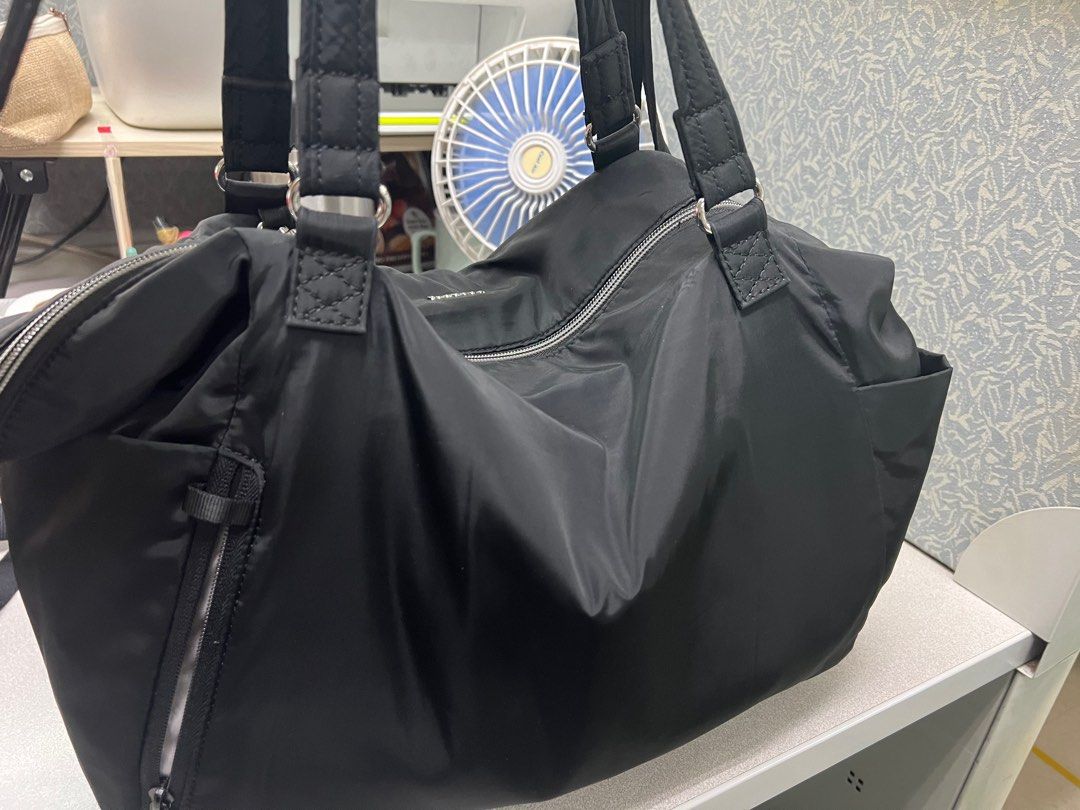 Pacsafe tote bag, Women's Fashion, Bags & Wallets, Tote Bags on Carousell