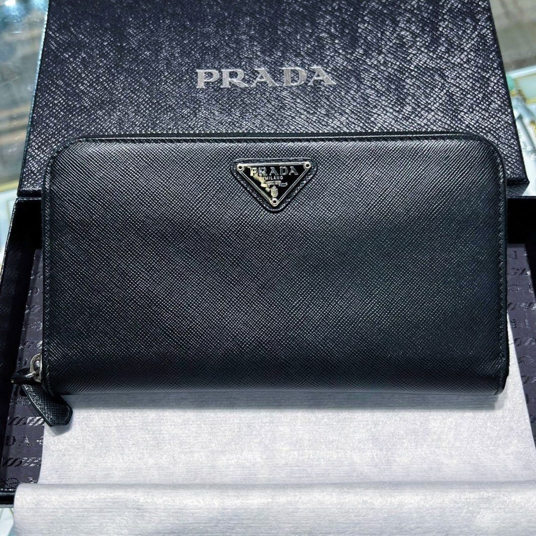 Authentic prada zippy wallet, Luxury, Bags & Wallets on Carousell