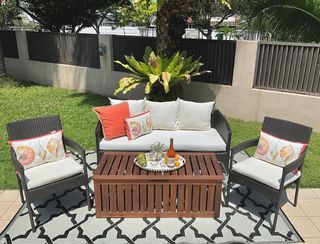 SOLD outdoor sofa, chairs and storage table
