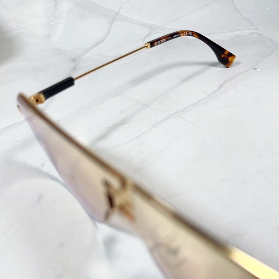 Fendi FE40005U Sunglasses, 32C Metal Shiny Thelios Gold / Silver with FF  Smoke Lens 57-15-0