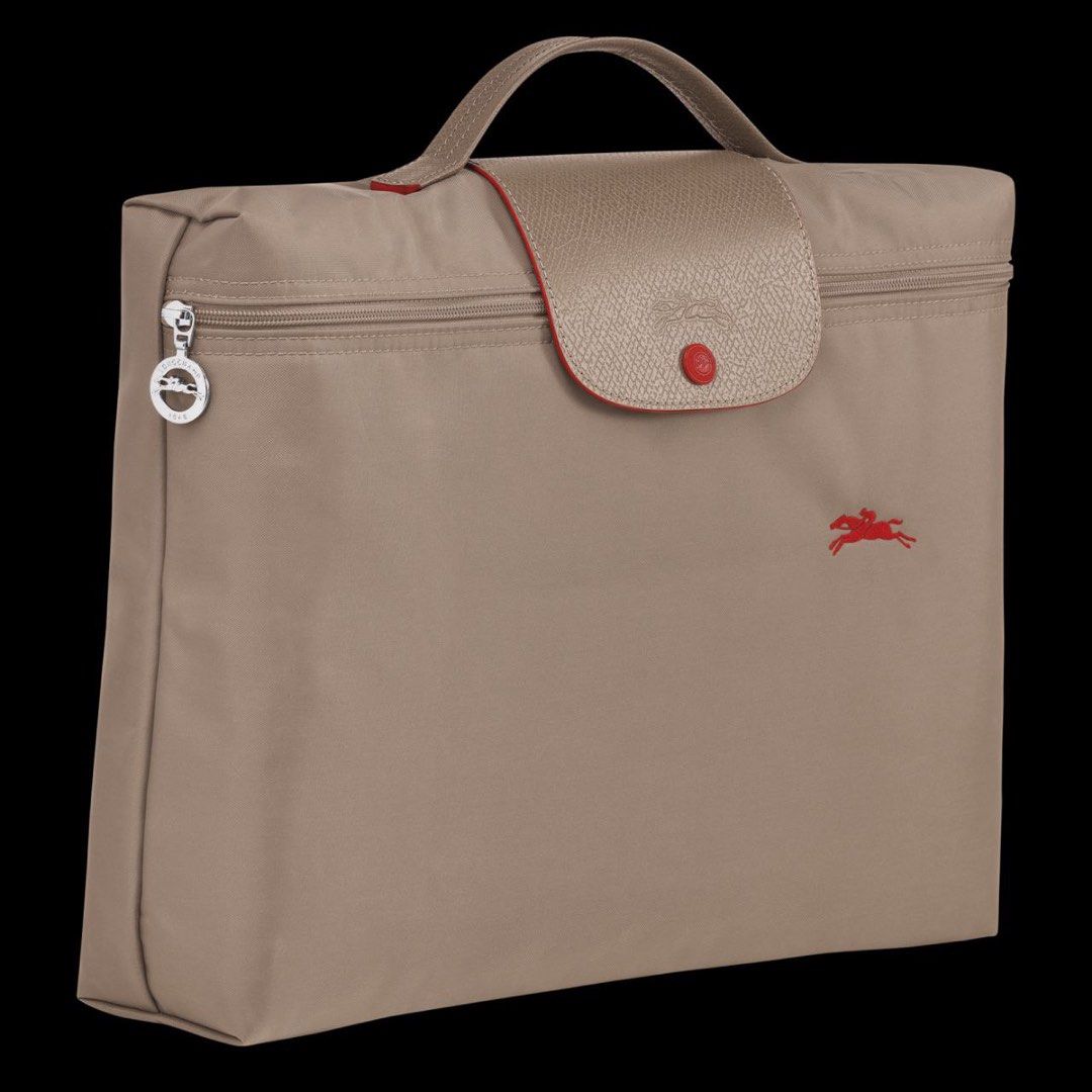 Authentic Longchamp Le Pliage Club Document Bag (Category: Luxury Bags & Wallets) located in Cebu City. Submitted by tala10 (Listing ID 1236731874, Image 1). Description: This is a new and unused Longchamp Le Pliage Club document holder. I think the official color is brown but it’s more of a grayish/beige tone. This was personally bought in Longchamp Rome (Spanish Steps boutique) pre-pandemic. The color is a limited/season release and is no longe