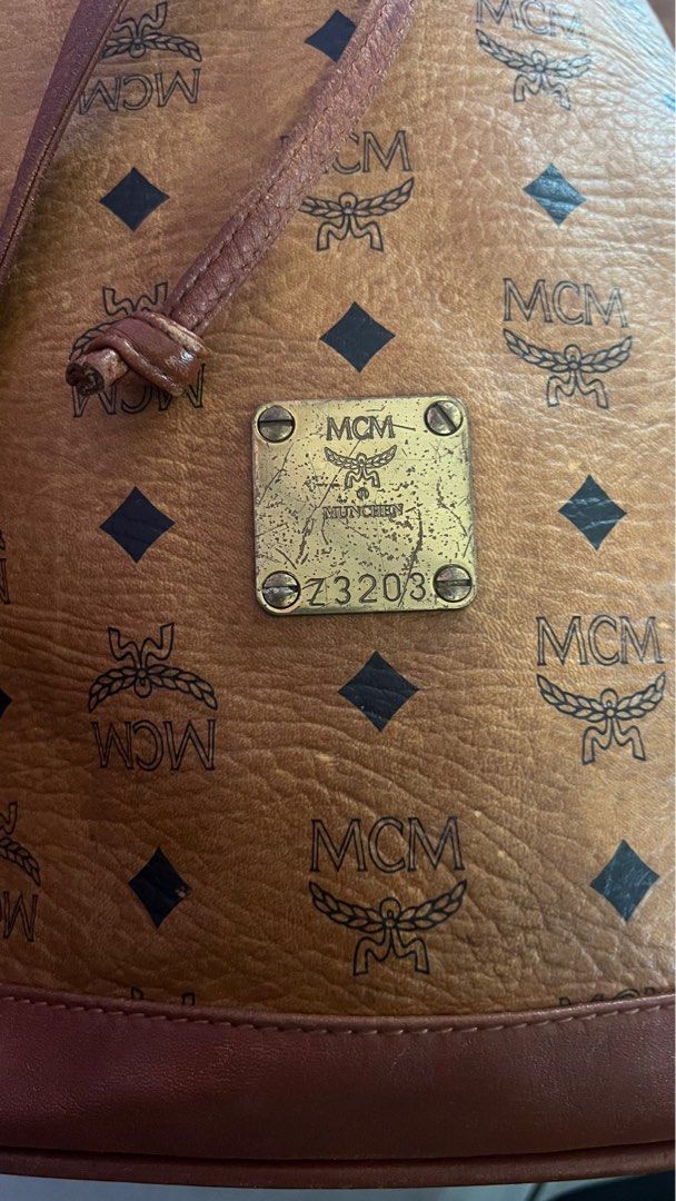 Mcm bag fake vs real sales