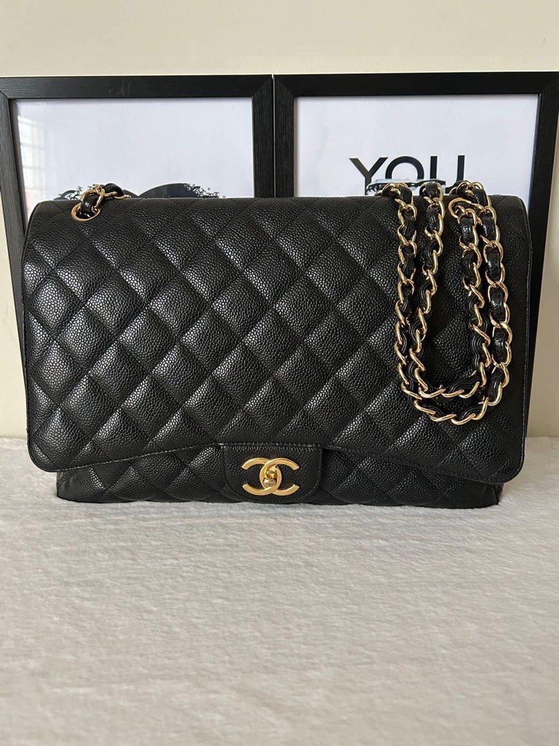 Chanel Classic Maxi Double Flap Bag (Category: Luxury Bags & Wallets) located in Manila. Submitted by bagislifeshop (Listing ID 1236670752, Image 2). Description: ▪️Chanel Classic Maxi Double Flap Bag▪️ ☑️Available in Pampanga ✅Series 14 ✅Condition: 8.5/10 ✅Material: Caviar leather ✅Colour: Black in gold hardware ✅Dimensions: 23 × 33 × 10 cm ✅Inclusions: hologram sticker, entrupy certificate and dustbag .