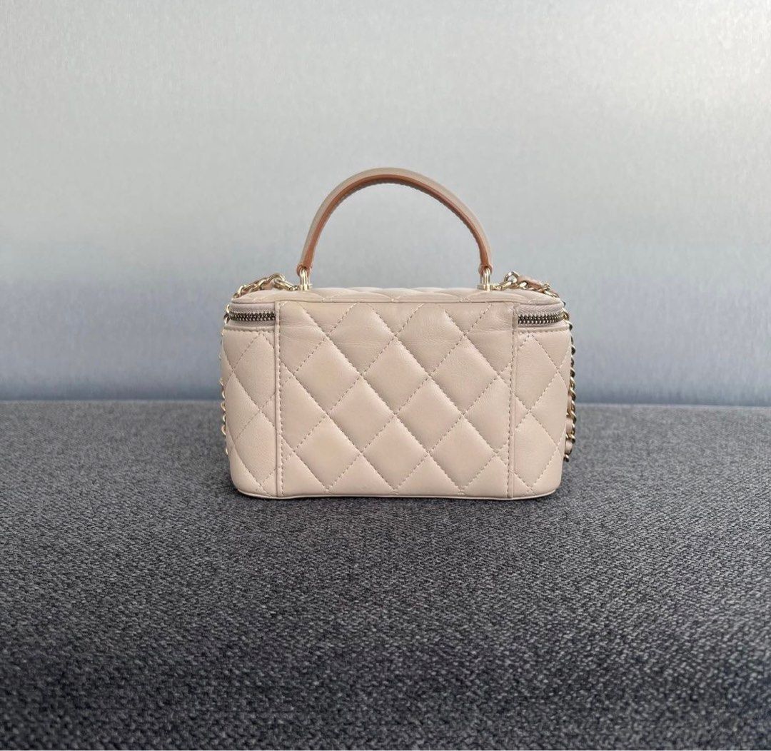 Chanel Long Vanity Handle Lambskin Ecru/Dark Beige Lghw, Luxury, Bags &  Wallets on Carousell