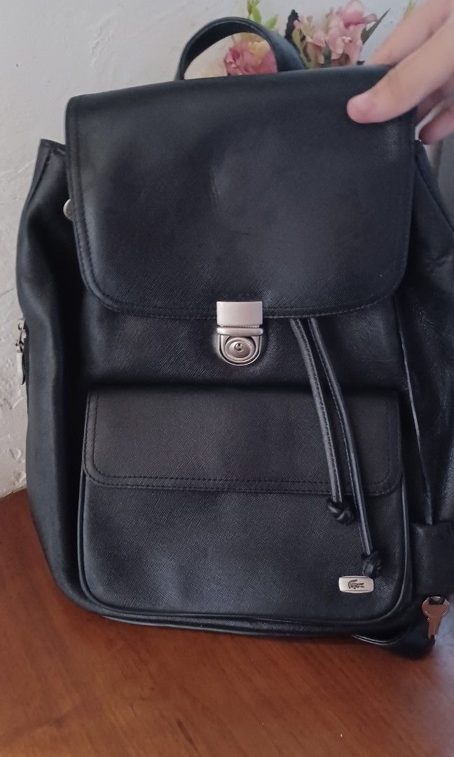 Lacoste leather backpack on Carousell
