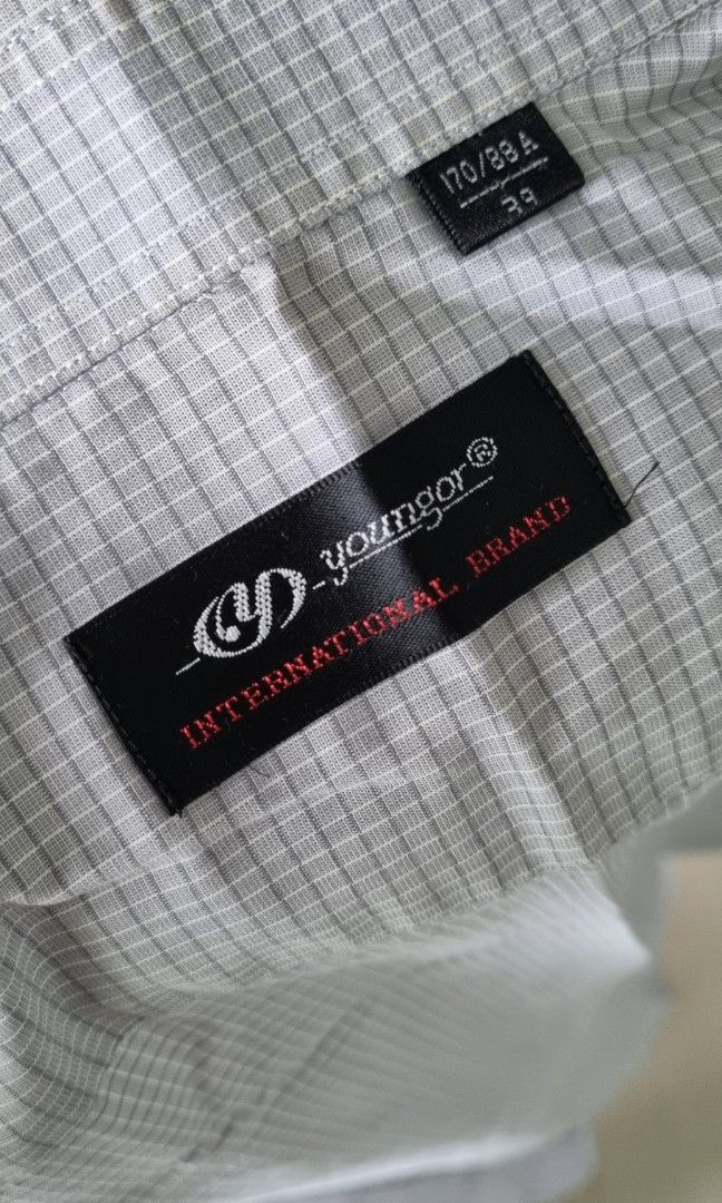 Light gray polo shirt (Category: Tshirts & Polo Shirts ) located in Quezon City. Submitted by averyav (Listing ID 1236700560, Image 3). Description: Light gray polo shirt In good condition, no flaws Size 170/88A on tag RFS: rarely used.