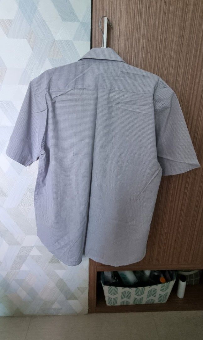 Light gray polo shirt (Category: Tshirts & Polo Shirts ) located in Quezon City. Submitted by averyav (Listing ID 1236700560, Image 2). Description: Light gray polo shirt In good condition, no flaws Size 170/88A on tag RFS: rarely used.