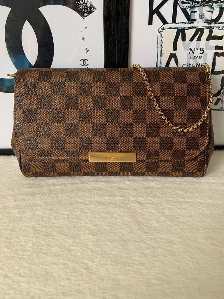 Louis Vuitton Favorite MM Bag (Category: Luxury Bags & Wallets) located in Manila. Submitted by bagislifeshop (Listing ID 1236736929, Image 2). Description: ▪️Louis Vuitton Favorite MM Bag▪️ ☑️Available in Pampanga ✅Date code: DU3146 ✅Condition: 8.8/10 ✅Material: Damier ebene coated canvas ✅Dimensions: 25 X 16 X5CM ✅Inclusion: dustbag, gold and leather straps, receipt, paperbag and box .