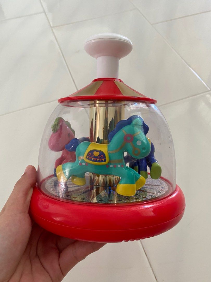 Push and shop spin carousel