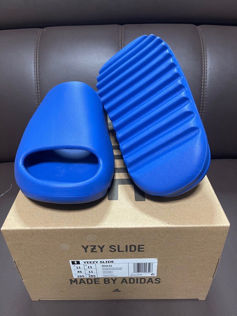 Yeezy Slides blue Azure, Men's Fashion, Footwear, Flipflops and Slides on  Carousell
